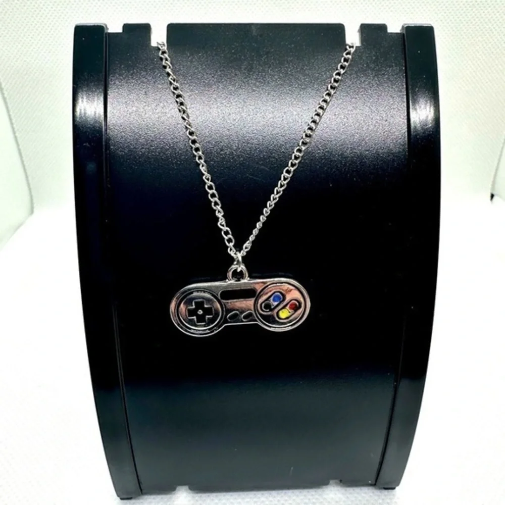 Video game‎ controller retro pendant​​​ 🦕